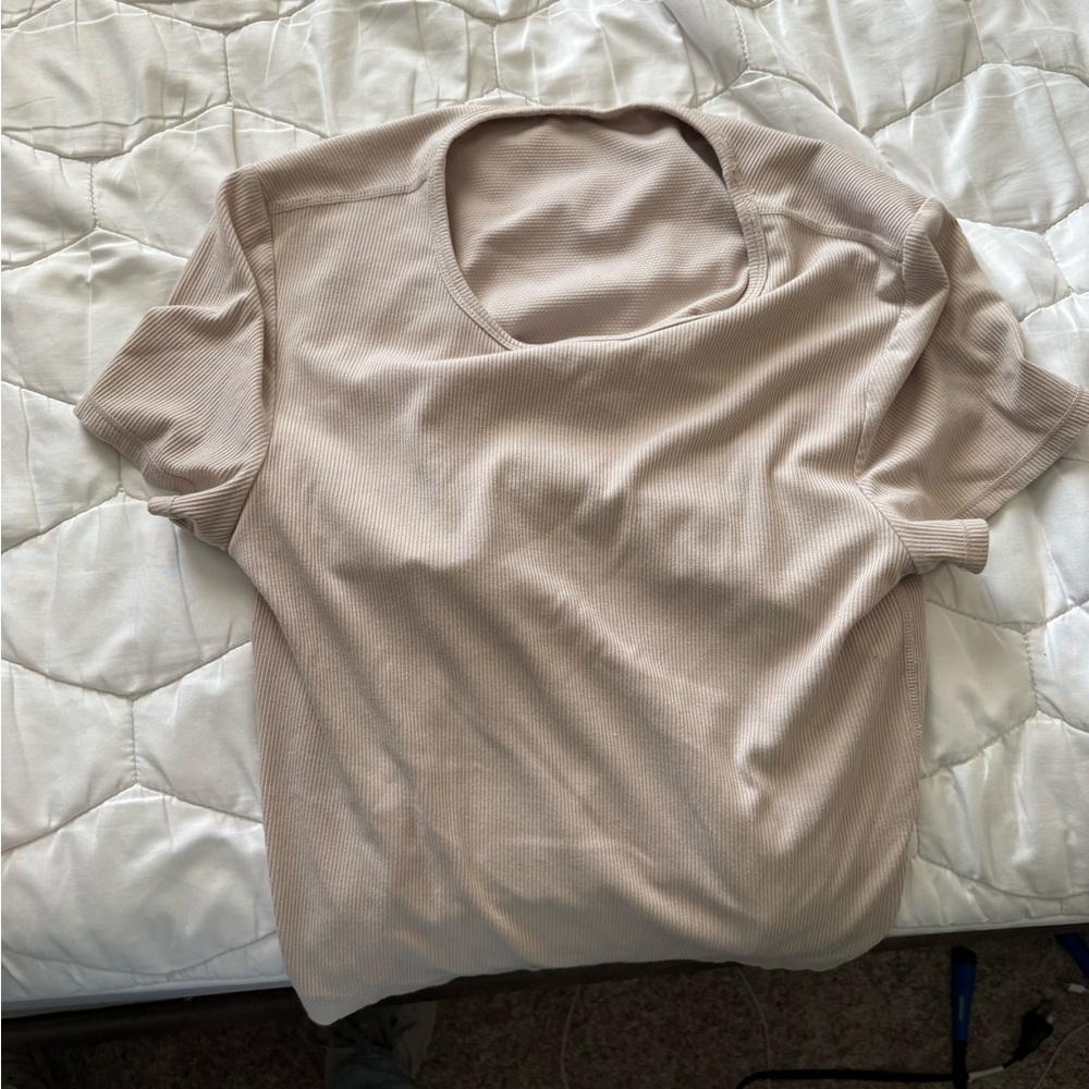 A thicker material, available at T.J. Maxx, features a bra-like layer.